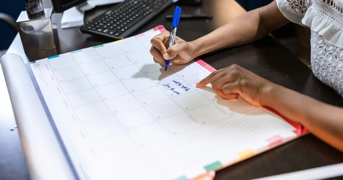Calculator and monthly budget sheet used to plan installment loans Hamilton borrowers repay over 12 to 60 months